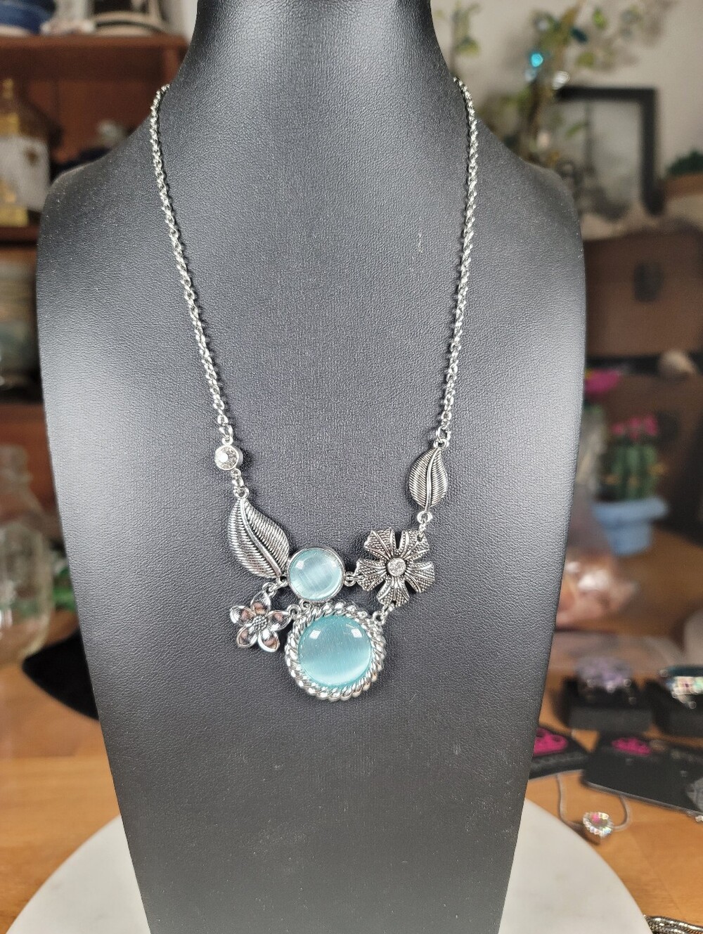 paparazzi Silver-Tone Floral Necklace with Aqua Blue Cat's Eye Stones